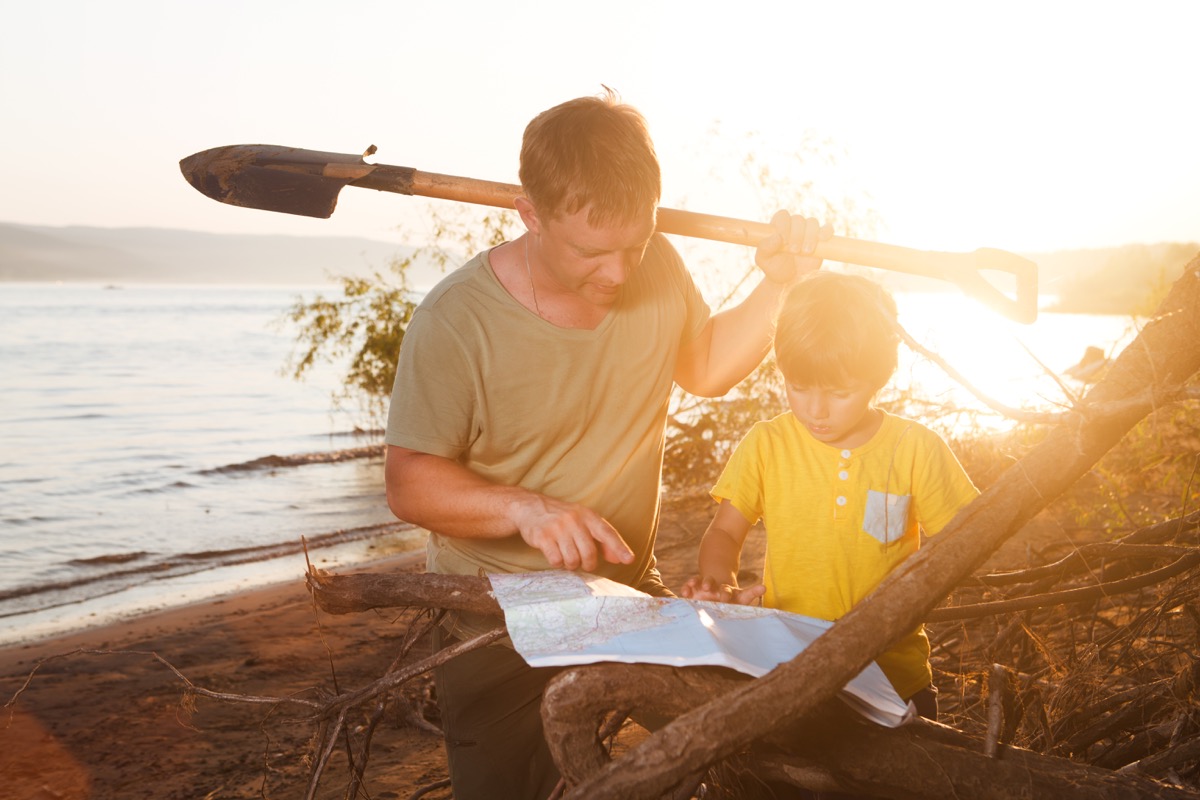 Looking for treasure. Look for Treasure. Looking for the Treasure. People looking for Treasure. Boy on the River Bank.